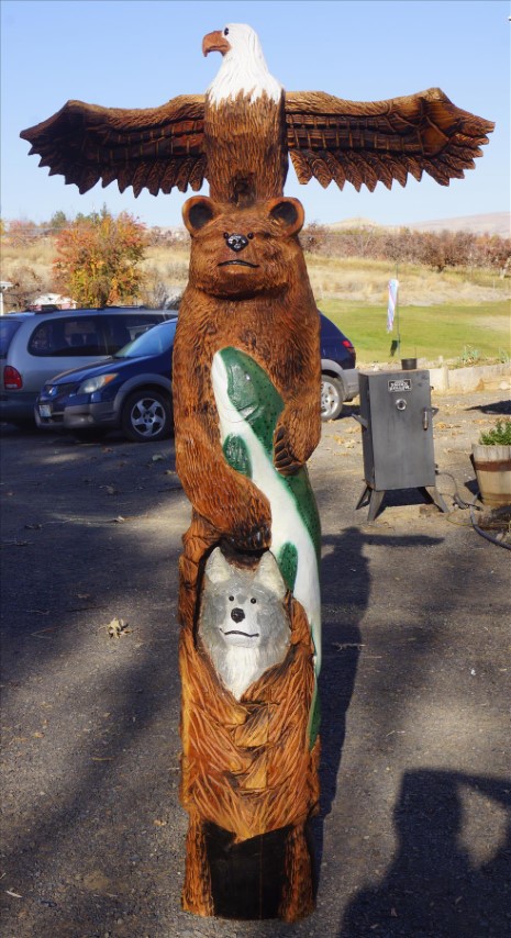 Eagle, Bear, Otter, Fish Totem Pole Carving